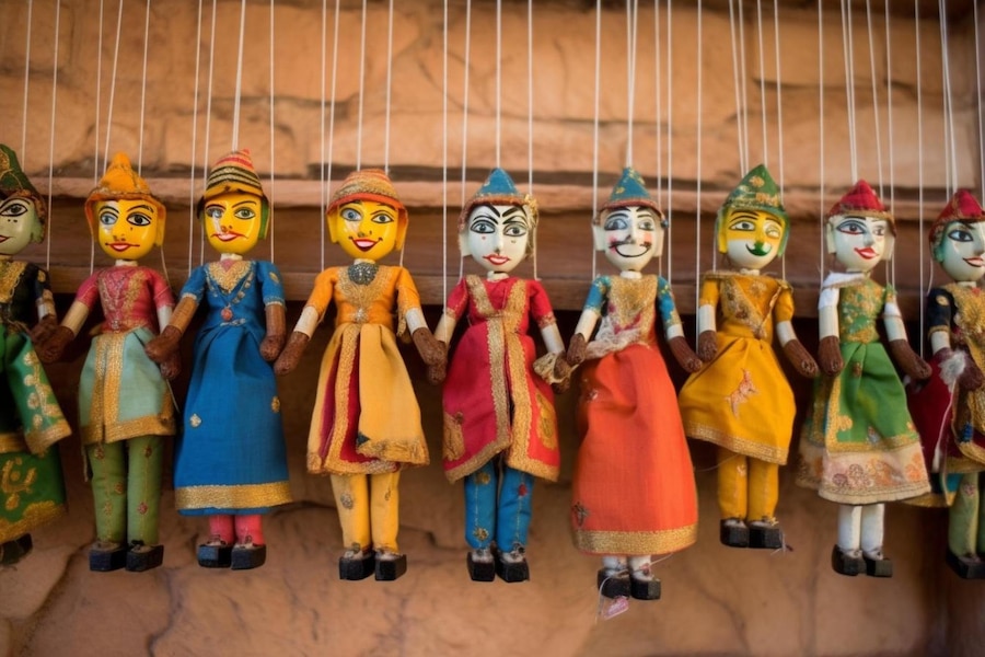 Home Decor Ideas, Traditional Rajasthani puppets hanging on a wall