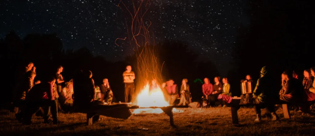 decoration ideas for lohri: Bonfire - The Heart of celebrating Lohri(in this pic  lighting a fire around sitting people) 