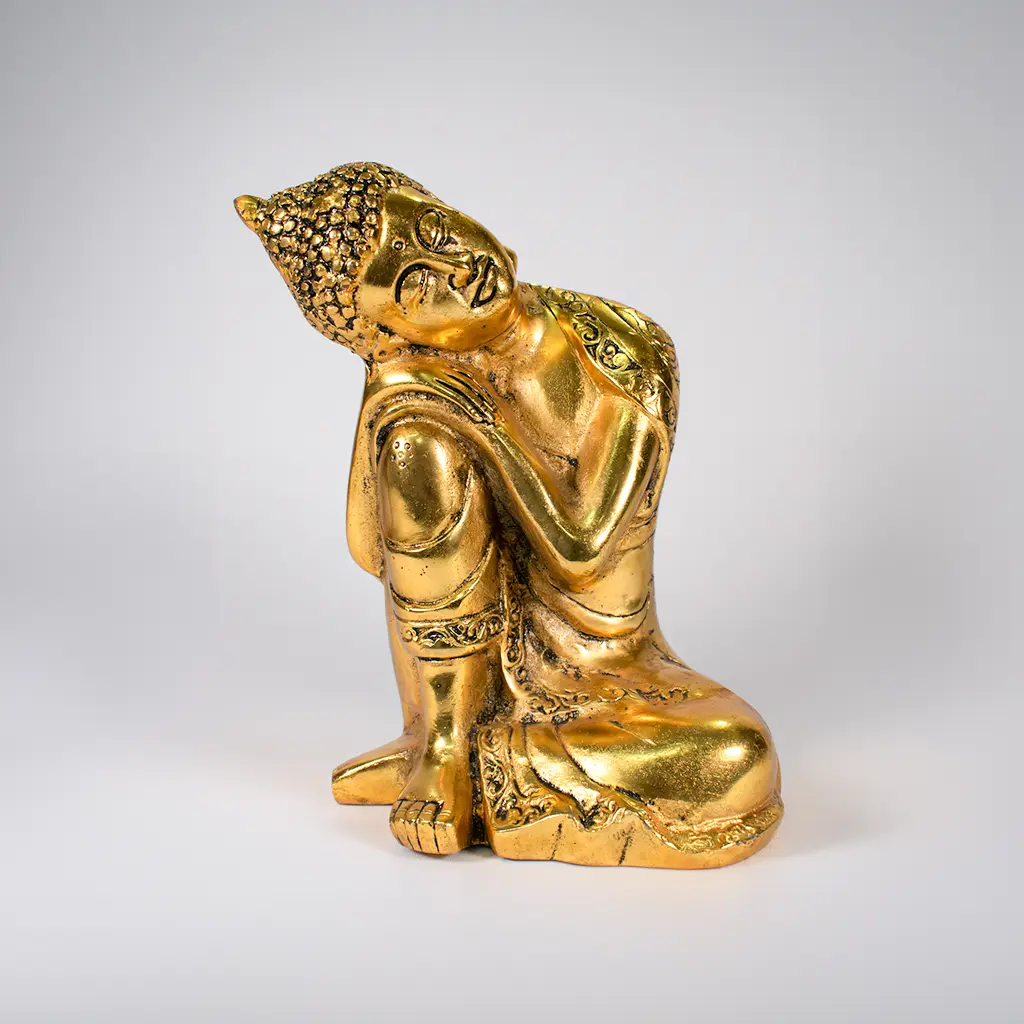 golden buddha serenity statue