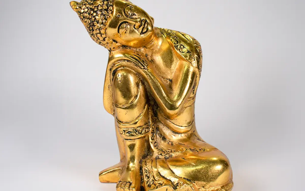 golden buddha serenity statue