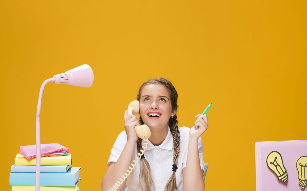 Teenager at desk with colorful planner open, surrounded by school supplies and a healthy snack. Text reads "Life Hacks for Teens".